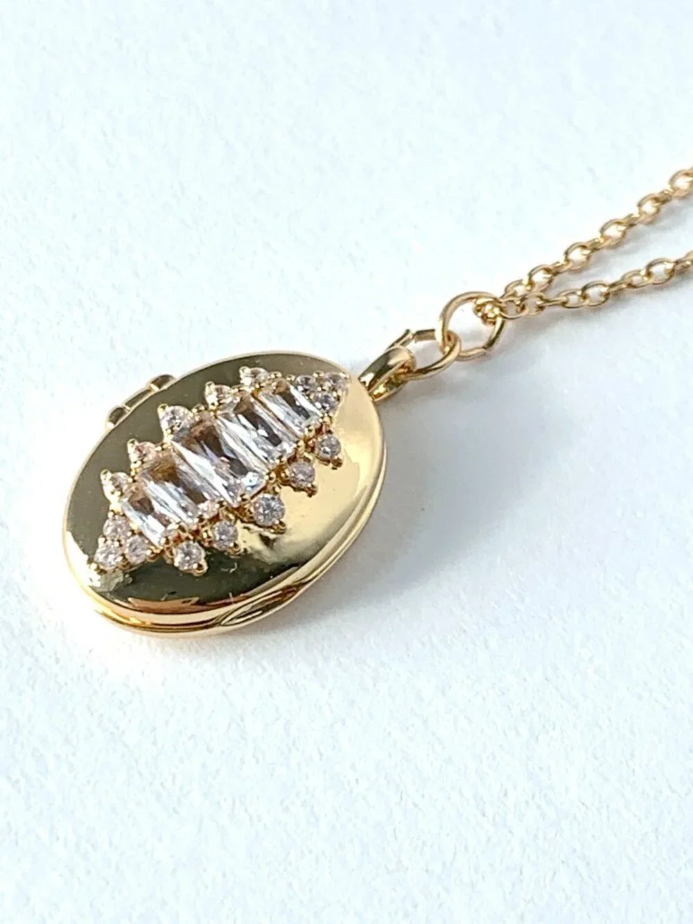 NEW ~ Anthropologie Oval CZ Baguette Gold Locket Necklace